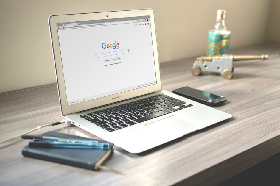 white laptop on a desk